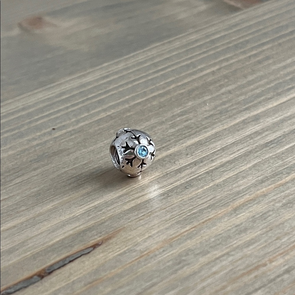 Retired Sterling Silver Pandora Christmas Snowflake with Aqua Zirconia